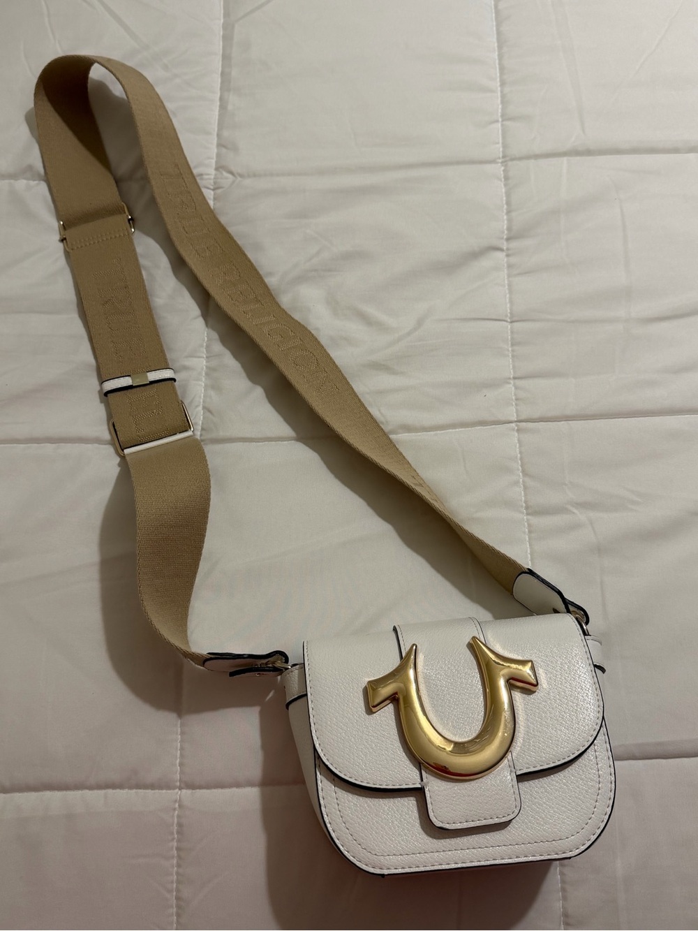 White Crossbody Saddle Bag with Gold Accent